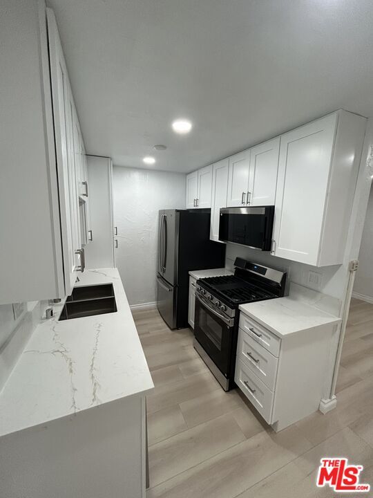 Building Photo - 735 W Milford St Unit 105