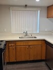 Efficient kitchen layout - 5255 Riverton Ave Apartments