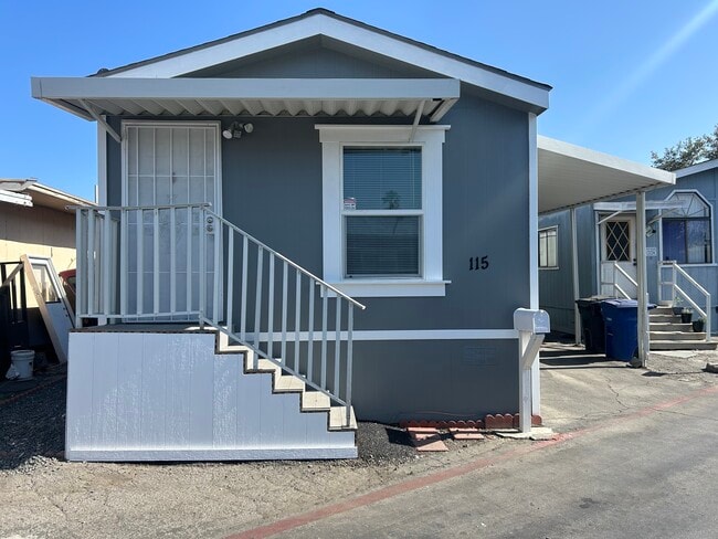 Building Photo - 6475 Atlantic Ave Unit Space 115