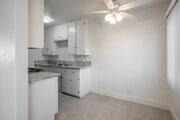 1BR, 1BA - 600SF - Dining Room and Kitchen - Palm Court Apartments