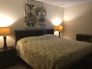 King Size Bed in Primary Bedroom - 400 N Sunrise Way Condo Unit 169
