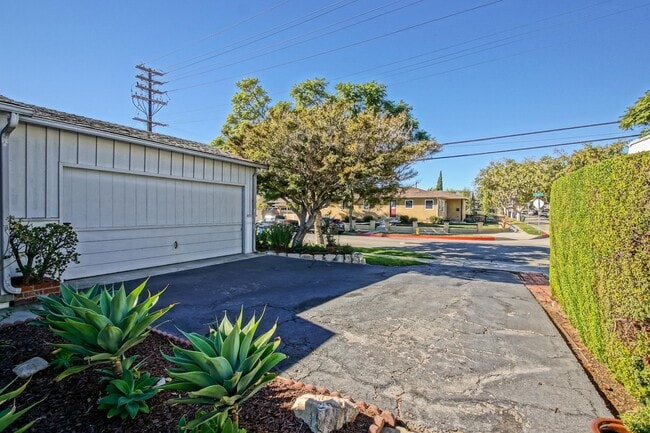 Photo - CHARMING, BRIGHT & AIRY HOLLYGLEN HOME W/ BEAUTIFULLY LANDSCAPED FRONT & REAR YARDS W/ PATIO BLOC...