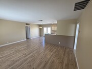 Living room and dining area. - 1450 E Granvia Valmonte
