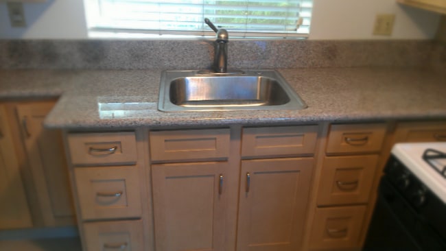 Building Photo - 7237 Milton Ave Unit 4