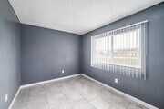 2BR, 1BA - 600SF - Primary Bedroom - White Street Apartments