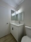 1/2 Bathroom on 1st floor - 10208 Beach St Townhome