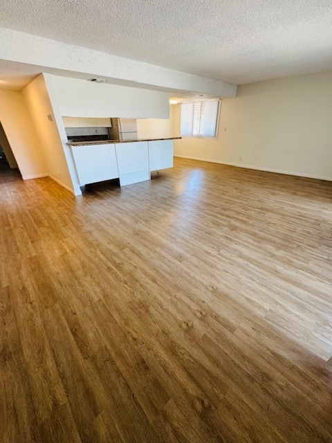 Living room to dining area and kitchen - 3650 W Clark Ave Unit C