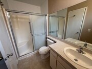 Primary bath with generous counter space and large mirror - 1134 W Huntington Dr Townhome
