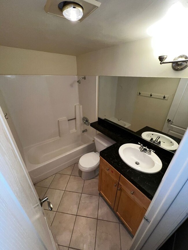 Photo - Upgraded Condo with 1 Attached Garage & Private yard.  Gated Complex.