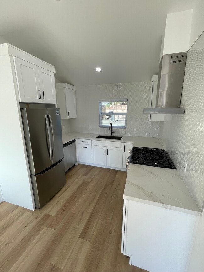 Updated kitchen featuring stainless steel appliances, quartz countertops and more! - 327 Aliso St