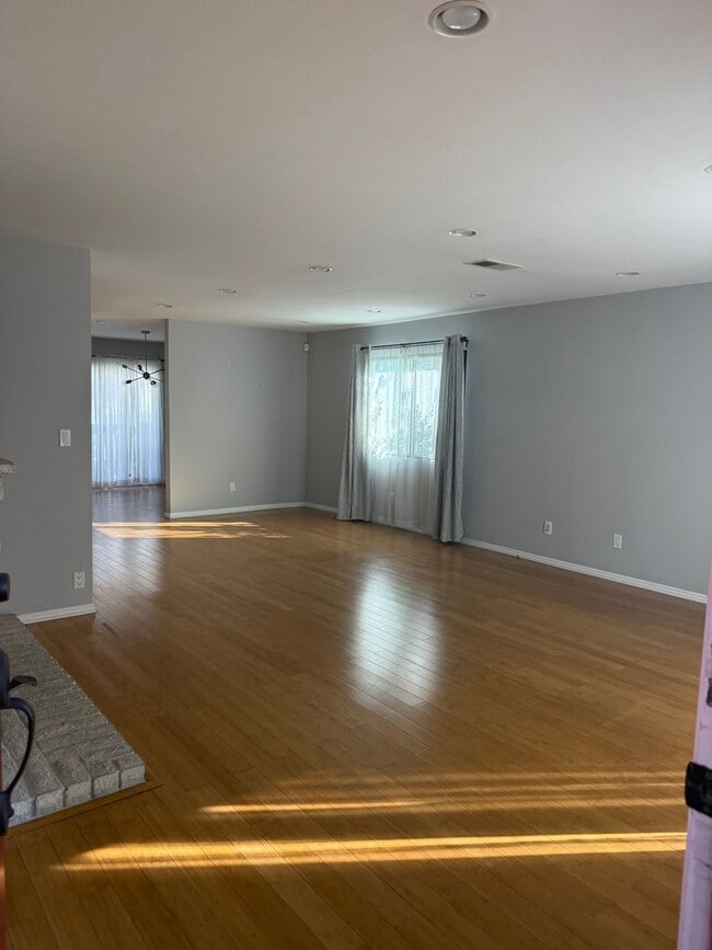 Photo - Turnkey End-Unit Townhome with Vaulted Ceilings & Garage