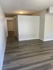 110- Living space/ Hall - Goshen Apartments Brentwood