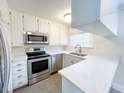 Photo - BEAUTIFUL 2 STORY TOWNHOUSE STYLE WITH A/C,  WASHER/DRYER, POOL, AND ONE PARKING SPACE