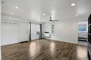 living room with heater and air condition - 418 E 14th St Apartment Unit 418