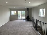 Gas fireplace, balcony and upstairs living room - 813 15th St Unit 813