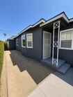 gated entry with private front yard - 4091 Rosecrans Ave