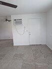 Living room facing front door - 4435 Bonnie Brae St Unit 3