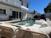 Photo - Coastal Elegance Meets Family Comfort in D... House