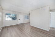 1BR, 1BA - 640SF - Living Room - DOTY (Ocean Breeze)