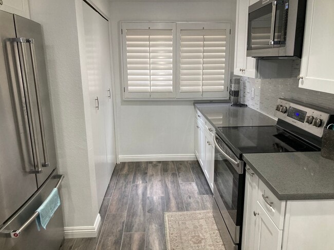 Photo - Beachside Furnished Retreat! Remodeled 2BD/2BA Condo Steps from the Sand! Unit 28