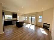 living room with Balcony - 5827 Carlton Way Apartments