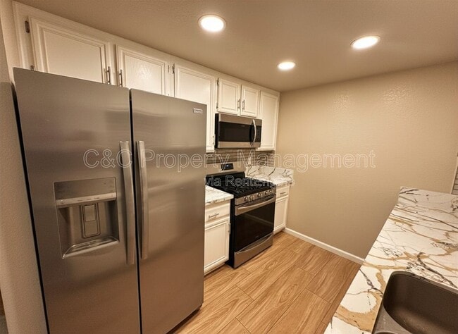 Photo - 1380 W 48th St Unit 116