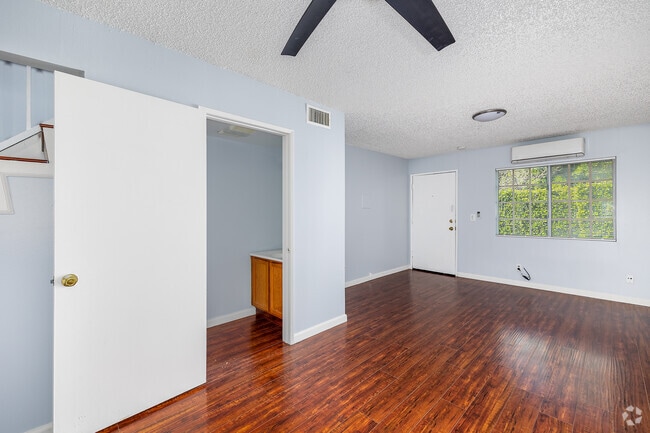 2BR, 1.5BA - 1,200SF - Living Room - Sunflower Norton Apartments