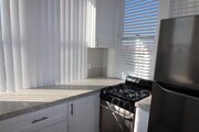 Attic Unit - Kitchen - The Victorian