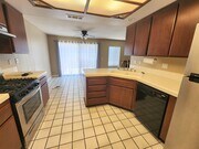 Kitchen with Refrigerator & Dishwasher - 630 W Palm Ave