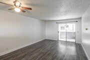 2BR, 2BA - 900SF - Living Room, Dining Room - 744 Rose Ave Apartments