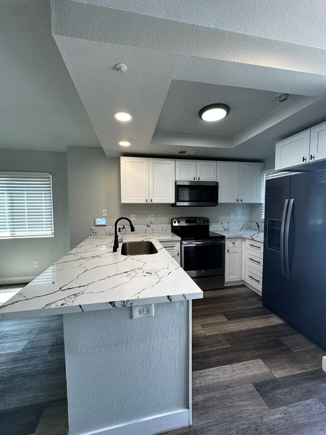 Photo - Renovated 2 Bedroom, 2.5 Bath with Washer and Dryer Plus A/C. MUST SEE!!!