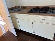 Stove and Sink - 10014 Lemona Ave Apartment Unit Studio Room