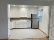 Kitchen with fridge - 2273 Fox Hills Dr Apartment Unit 2273 Fox Hills Dr