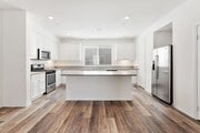 Photo - Modern Tri-Level Townhome in Gated Gardena Community with 2-Car Garag
