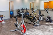 Fitness Center - Bay Towers at Bixby Knolls - 55+ Senior Ap... Apartments