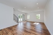 Living room opposite view - 5257 S San Vicente Blvd Townhome