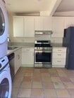 Kitchen with laundry - 167 Norfolk Dr House