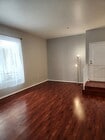 Front door to unit with stairs entering the living - 7037 La Tijera Blvd Condo Unit A101