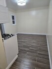 Living room and kitchen open floor plan - 2722 W 73rd St House