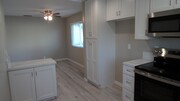 Photo - REMODELED 2BR; 2BA end unit condo with 1 car garage & 1 parking space