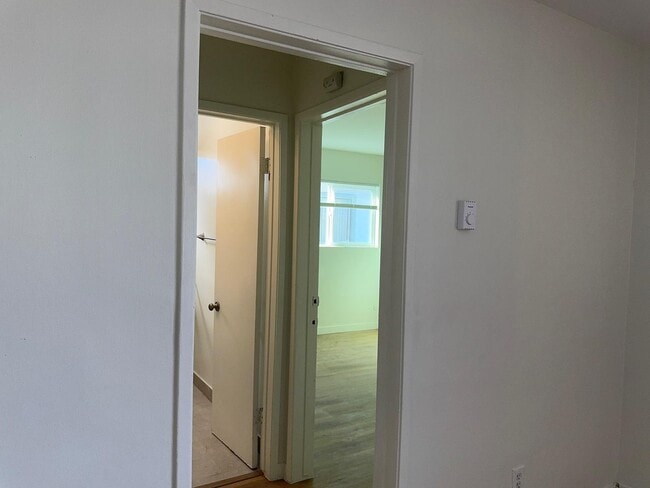 Entry door to bedroom - 13401 Victory Blvd Unit #8