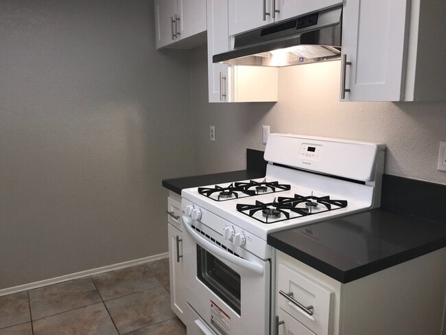 Building Photo - COMING SOON! 2 Bedroom / 2 Bathroom Townhome in San Bernardino w/ Garage!