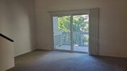 livingroom and balcony view - 7131 Farralone Ave Condo Unit 83