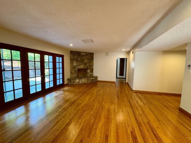 Photo - Charming 4-Bedroom Home on a Quiet Tree-Li...