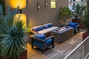 Comfortable rooftop seating and fire pit - The Brockman Lofts