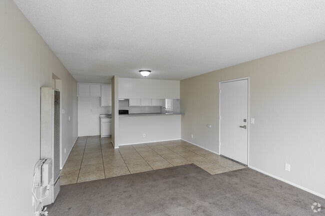 2BR, 2BA - 700SF - Living Room, Kitchen - 1636 E 6th St.