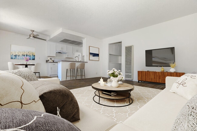 * Photos have been virtually staged for illustrative purposes. The furnishings, decor, and certain visual elements shown may not be present in the actual apartment. - Woodglen Apartment Homes