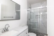 2BR, 2BA - 916SF - Primary Bathroom - 4021 Stevely Ave Apartments
