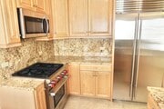 Kitchen - 210 S Spalding Dr Apartments