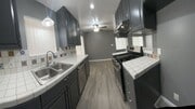 Photo - LARGE 2 BEDROOM 1 BATH UPSTAIRS UNIT WITH ... Apartment Unit 828A